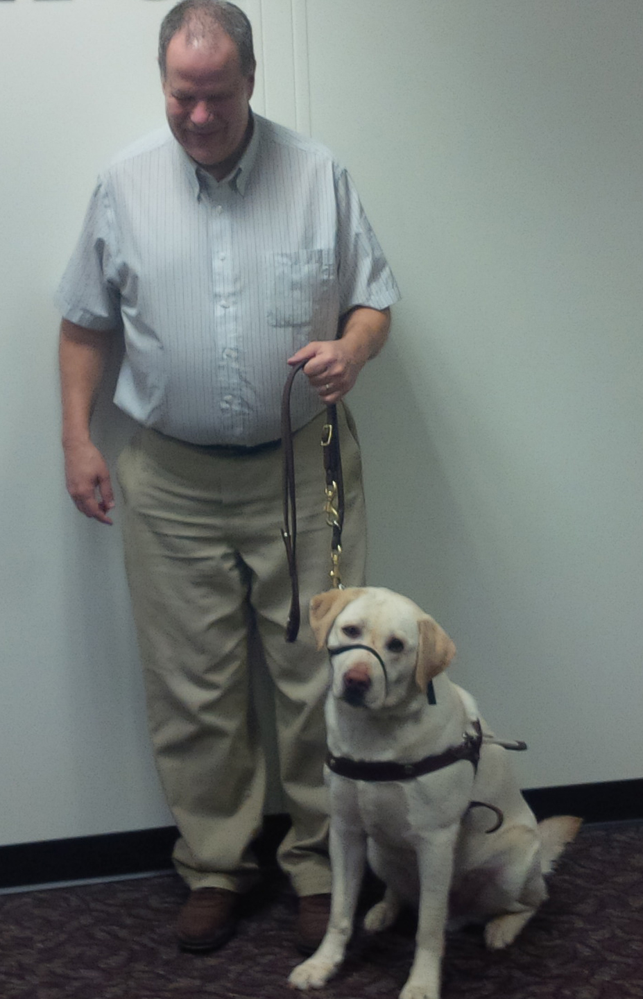 Odie the dog and Brian his handler