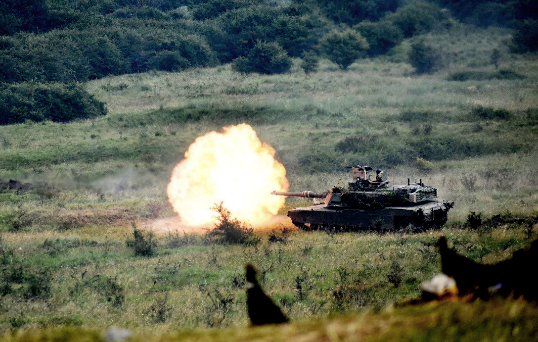 An M1A1 Abrams fires on targets as part of Getica Saber 17. The Resolute Castle 2017 projects directly support such exercises by building Joint National Training Center infrastructure necessary for training armor crews. Both fall under Operation Atlantic Resolve, an effort to reassure NATO partners of U.S. commitment to the alliance and deter regional threats.