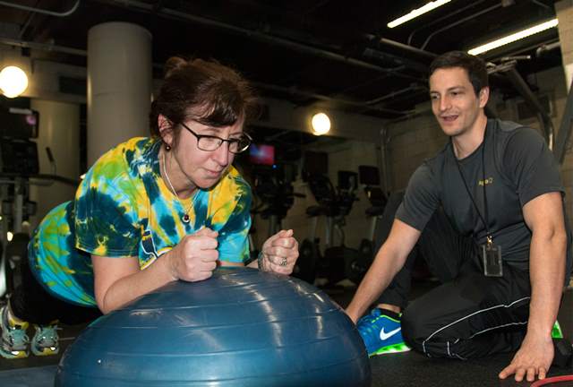 An employee is in the gym as part of a Resilience activity