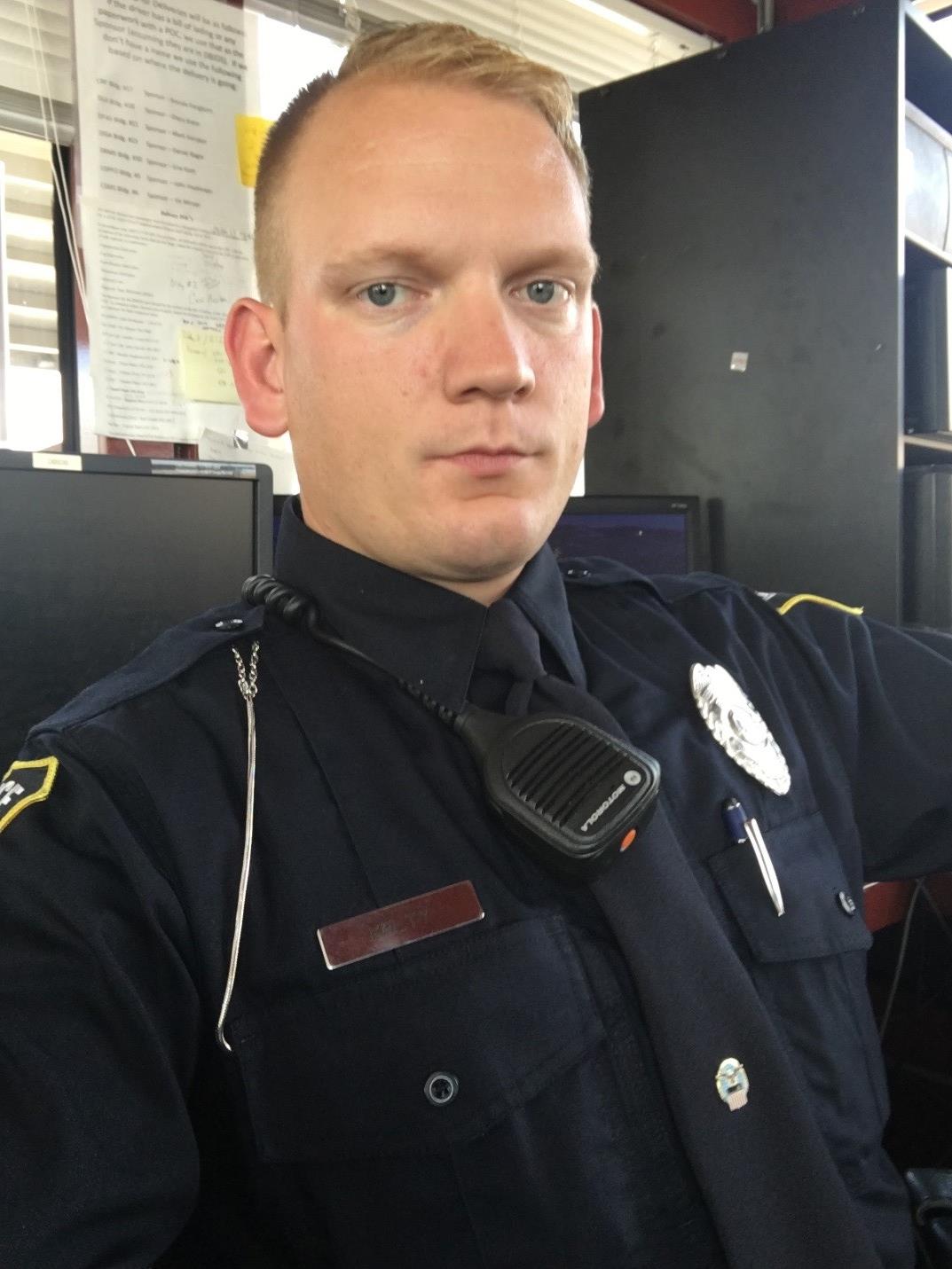 Police Officer Kelty in the office