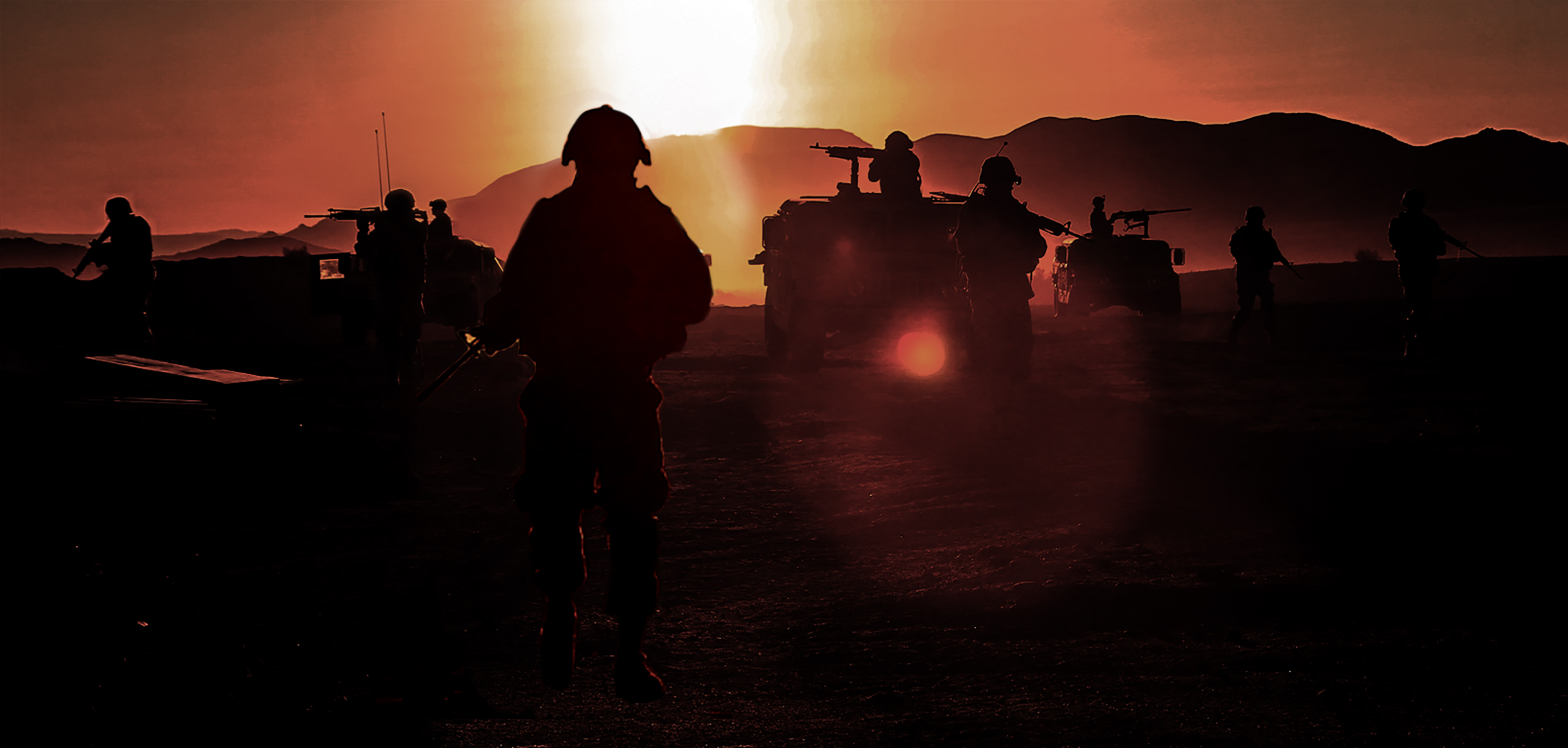 Servicemembers in silhouette