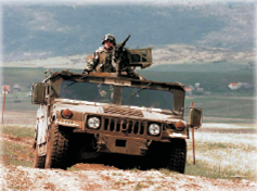 Picture of Land and Maritime employee in a combat vehicle