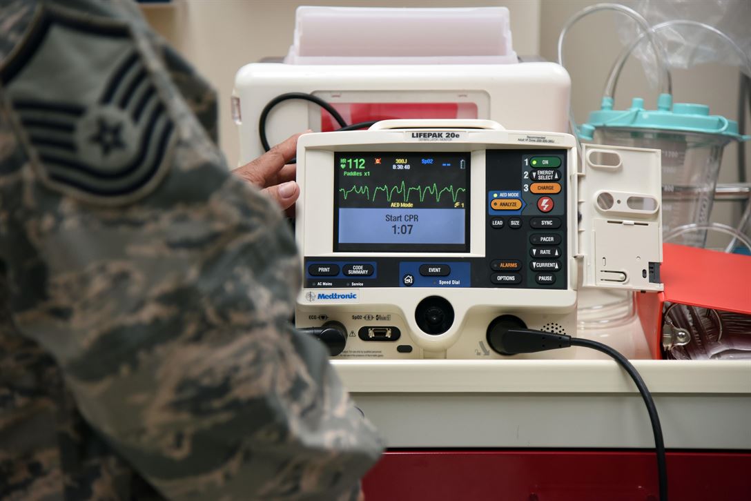 A service member using electronic medical equipment